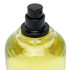 Jean Lowe Immortel spray cap close-up highlights bold, sophisticated fragrance.