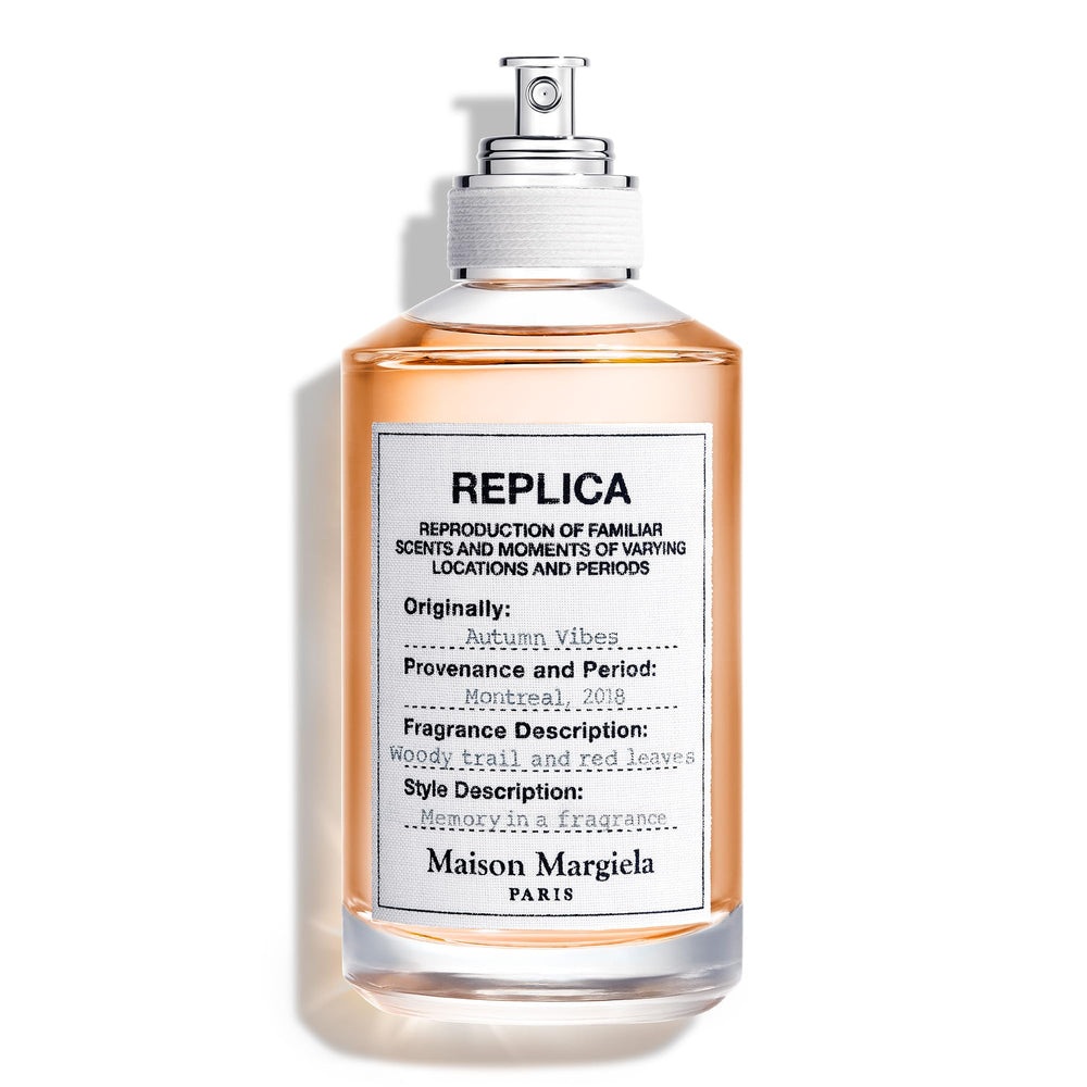 Maison Margiela Replica Autumn Vibes bottle closeup highlights woody notes for daily wear.