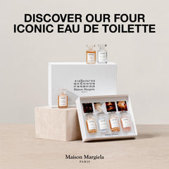 Maison Margiela Replica By the Fireplace miniature evokes fireside coziness for nights out.