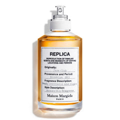 Maison Margiela Replica Jazz Club bottle embodies warm evening scent for refined nights.