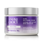 The Mane Choice Alpha Curly Curl Defining Cream bottle highlights hydrated curls and frizz control.