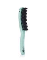 Mane Master curved brush closeup by Smooth Stick softens frizz with premium boar bristles.