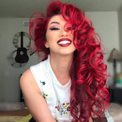 MANIC PANIC Vampire Red on hair during application demonstrates intense color uptake.