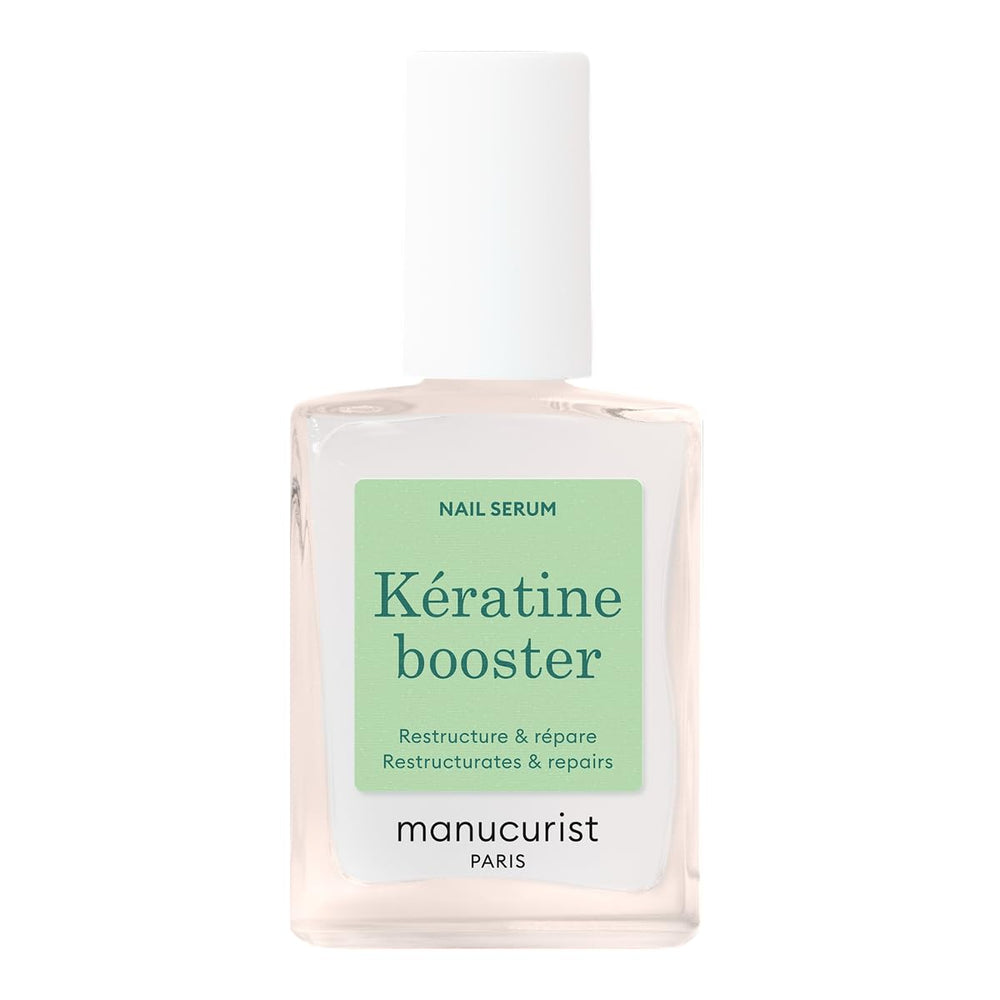 Manucurist Keratin Booster bottle applied to nails for stronger, nourished nails.