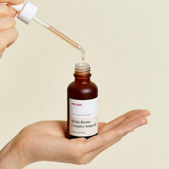 MA:NYO Bifida Biome Complex Ampoule Serum closeup texture highlights lightweight hydration.
