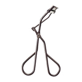 MAQuillAGE Edge Free Eyelash Curler closeup shows precise curl.