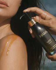 MARA Sea Sculpt Body Oil abs-thighs-sculpting-ritual demonstrates targeted toning and self-care.