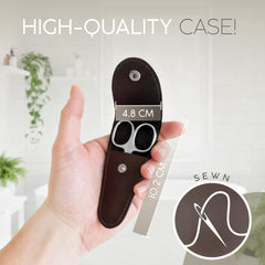 marQus Solingen curved cuticle scissors used for precise eyebrow grooming.