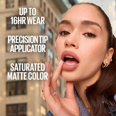 Maybelline Super Stay Matte Ink Loyalist lip color on lips emphasizes soft matte finish.