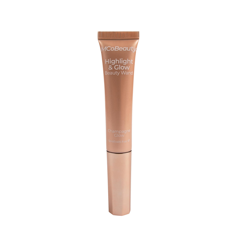 MCoBeauty Highlight and Glow Wand Champagne bottle glistening for radiant skin.