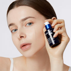 Medicube Zero Pore Serum drops on palm illustrate gentle overnight exfoliation and skin nourishment.