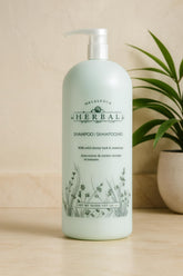 Melaleuca Herbal Shampoo bottle 32 oz promotes shine and manageable hair.