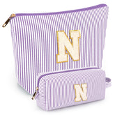 Mibasies initial makeup bag front-view keeps cosmetics organized for travel.