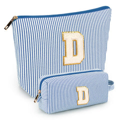 Mibasies initial makeup bags blue front view illustrate a stylish travel companion for cosmetics organization