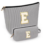 Mibasies initial makeup bags pair in black offer compact travel storage for cosmetics.