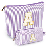 Mibasies initial makeup bags purple two-piece set for organized travel.