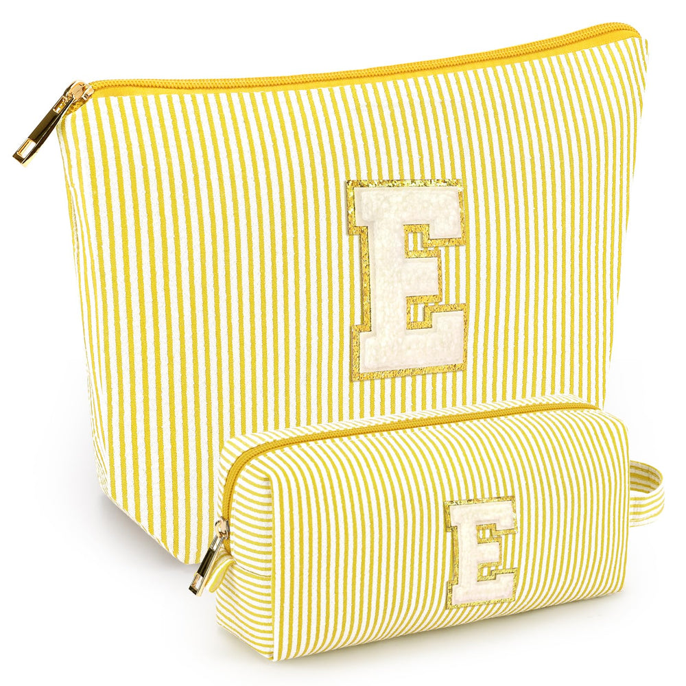 The mibasies initial makeup bags in yellow shown in full view for portable travel storage.