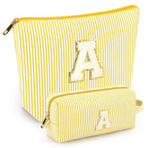 Mibasies two-pcs initial makeup bags in yellow for portable cosmetic organization on the go