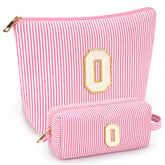 Mibasies two-piece pink makeup bag front view showcasing travel-ready design