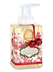 Michel Design Works Christmas Wonderland foaming hand soap bottle with sweet clover scent for gentle cleansing.