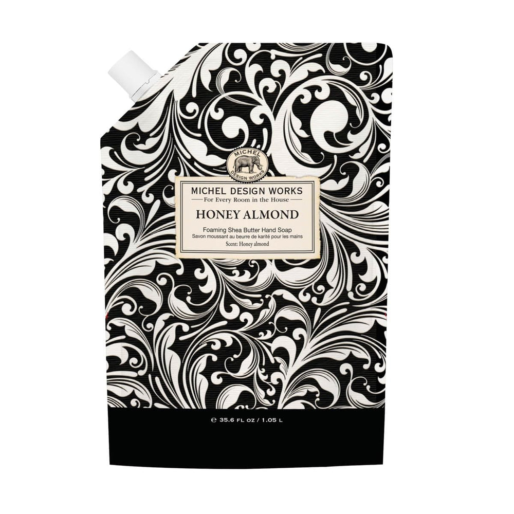 Michel Design Works Honey Almond Foaming Hand Soap Refill bottle showing shea butter formula for gentle moisturizing.