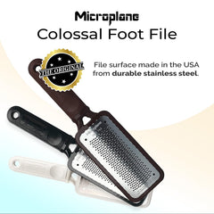 Microplane Colossal Foot File wet-use close-up highlights rust-resistant steel for spa-like pedicures at home.