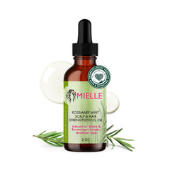 Mielle Organics Rosemary & Mint Hair Oil bottle closeup showing scalp nourishment
