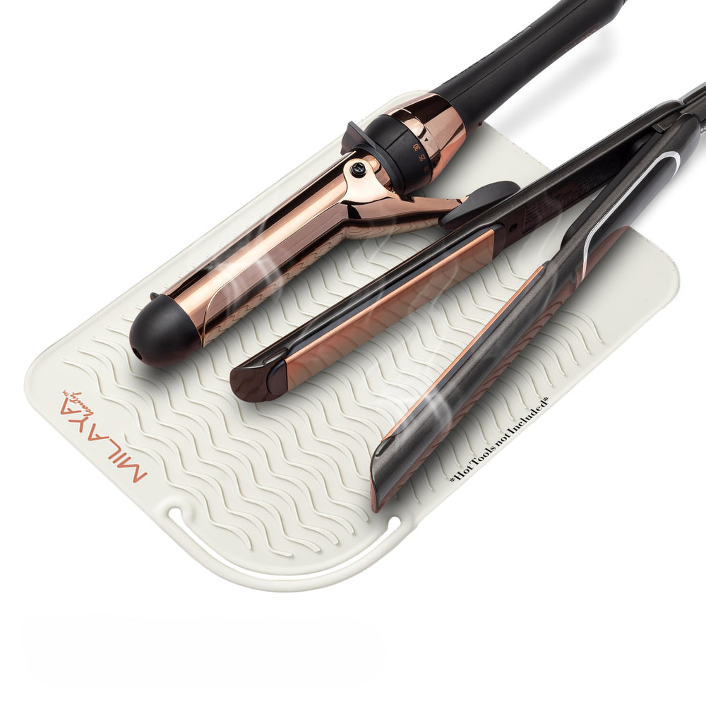 Milaya Beauty surface-protection mat showing heat-safe placement of tools