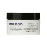 Milbon Matte Texturizing Paste packaging shows premium salon styling and durable matte hold.