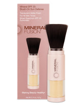 Mineral Fusion brush-on powder sunscreen application shows an invisible matte finish.