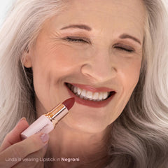 Mineral Fusion Lipstick Negroni application closeup demonstrates easy glide and moisture