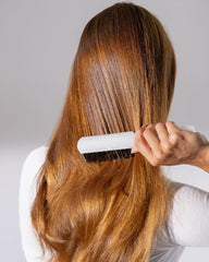 Mirta De Perales daily hairbrush used on ponytail for sleek, tension-free styling.