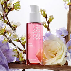 Mise En Scene Perfect Serum packaging close-up emphasizes nourishing oils for smoother hair