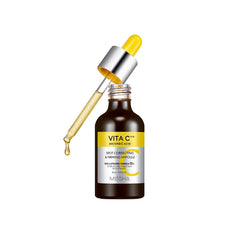 MISSHA Vita C Plus ampoule bottle close-up showing vitamin C encapsulation for absorption