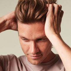 MITCH Clean Cut application palm demonstrates pliable texture for shaping.