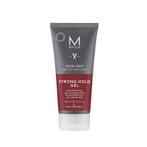 MITCH Iron Grip bottle pour demonstrating long-lasting hold for defined hairstyles.