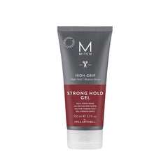 MITCH Iron Grip bottle pour demonstrating long-lasting hold for defined hairstyles.