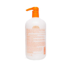 Mixed Chicks Gentle Kids Conditioner label close-up shows fragrance-free formula for sensitive scalps.