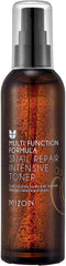 MIZON Snail Repair Intensive Toner applied to hand for smooth texture prep.