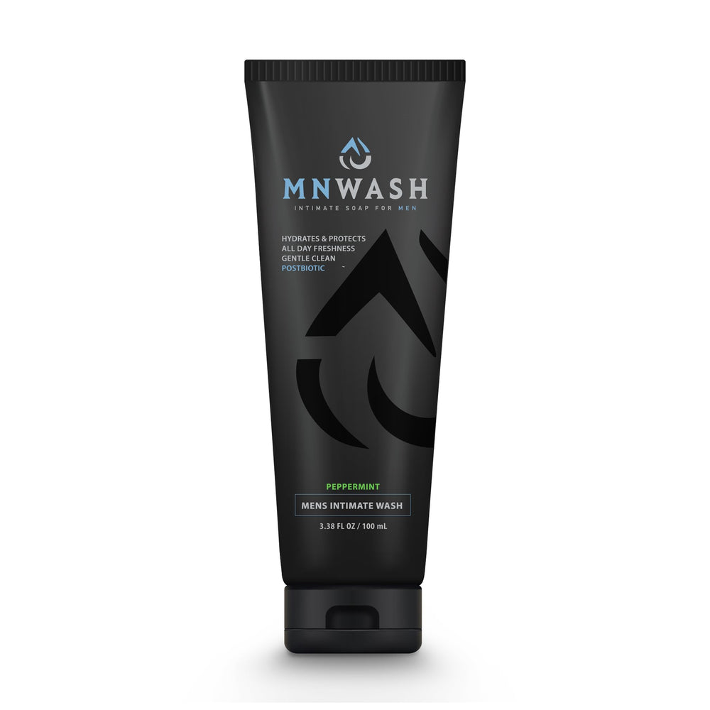 MNWASH intimate-wash bottle close-up highlighting postbiotic hydration for sensitive skin.