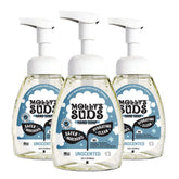 Molly's Suds foaming hand soap bottle close-up showing aloe and coconut oil for hydration.