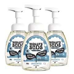 Molly's Suds foaming hand soap bottle close-up showing aloe and coconut oil for hydration.