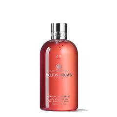 Molton Brown bottle front packaging showing label and recycled plastic benefit