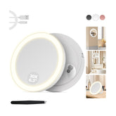 MOMOKUBA 30X magnifying mirror on suction cup for precise makeup inspection.