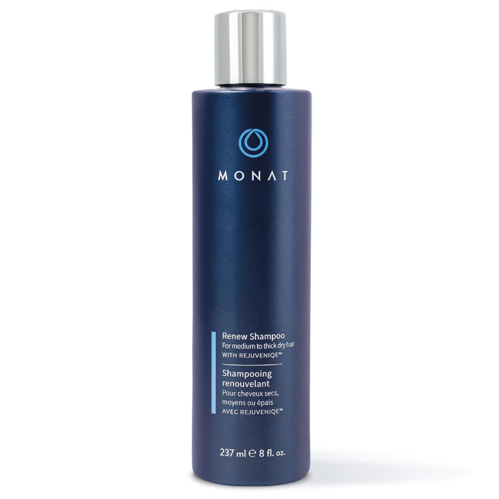 MONAT Renew Shampoo bottle pour showing ultra-hydration for dry hair