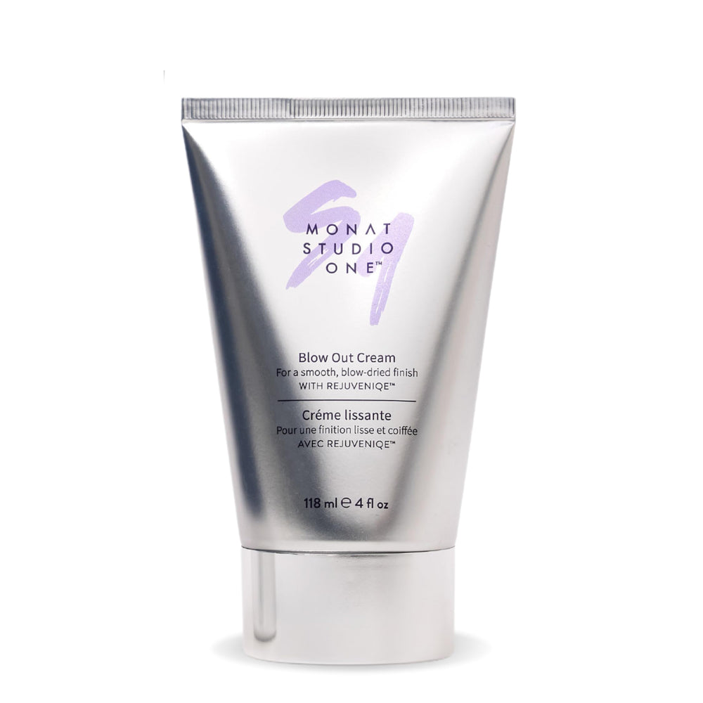 MONAT Studio One Blow Out Cream bottle boosts frizz control for sleek hair.