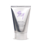 MONAT Studio One Blow Out Cream bottle boosts frizz control for sleek hair.