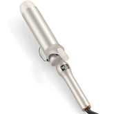 Mooqlizz curling iron 2in barrel creates loose waves with body.