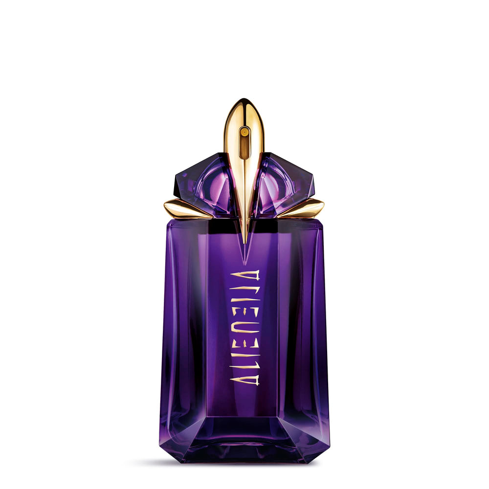 Mugler Alien bottle closeup highlights luminous jasmine notes for confident daytime wear.