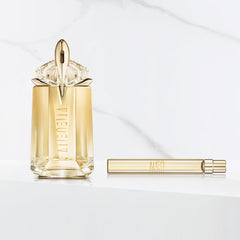 Mugler Alien Goddess bottle cap closeup signaling luxury packaging and finish.